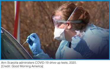 Ann Scarpita administers COVID-19 drive-up tests, 2020. [Credit: Good Morning America]