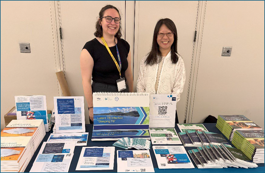CITC Program Manager Gal Tabachnik (left) and Director of Education Jeannie Fong distribute TB educational resources to conference participants